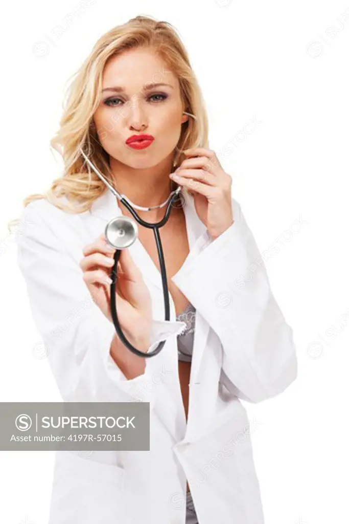 A sexy young doctor wearing a labcoat and lingerie holding a stethoscope