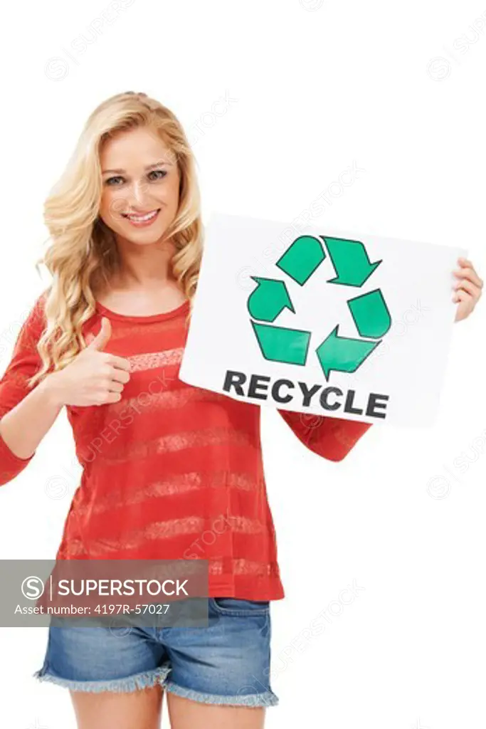 A beautiful young woman holding a recycling sign and giving you a thumbs up - Isolated
