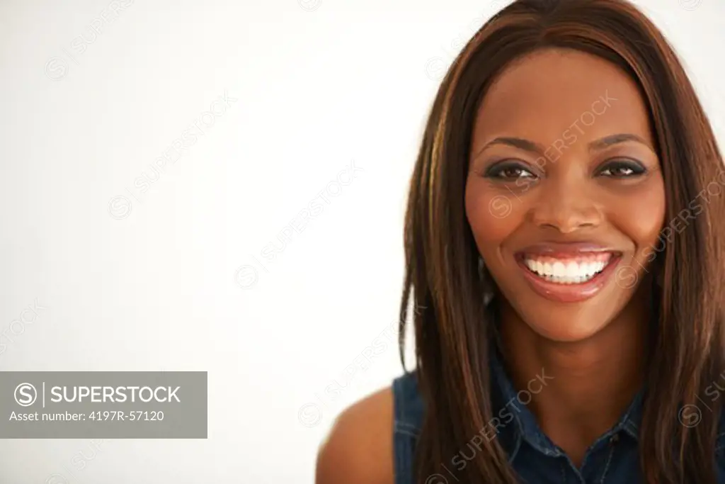 Portrait of an African American young woman smiling at you