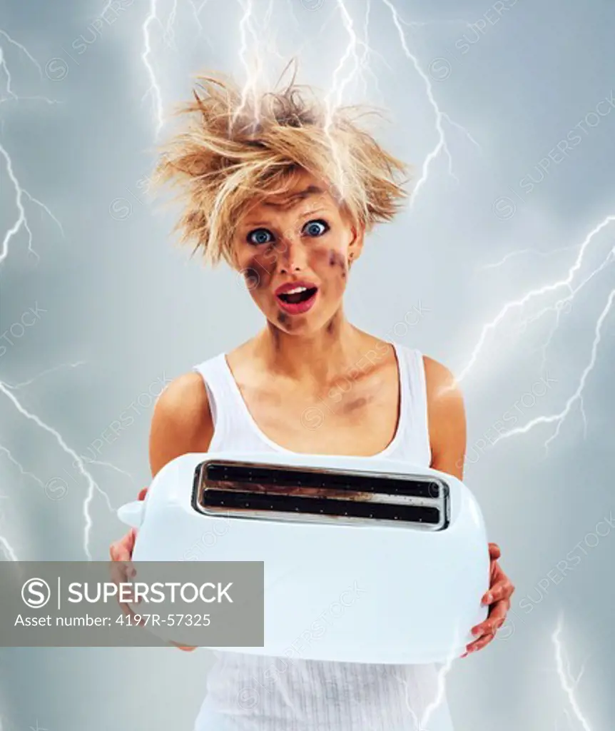 Shocked young woman holding a toaster and surrounded by electricity and lightening