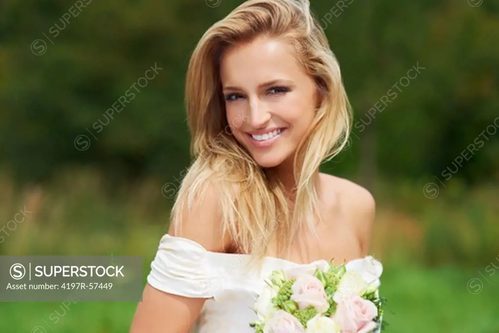 Portrait of the blushing bride on the day of her wedding