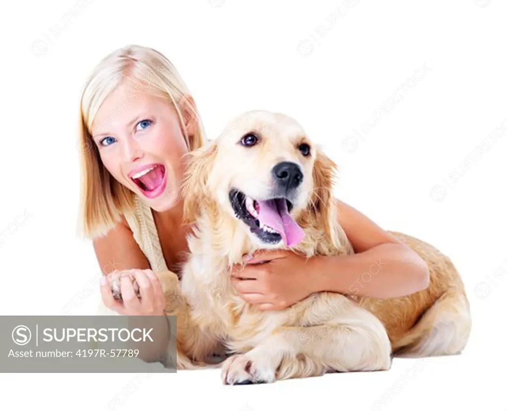 A gorgeous young woman pulls a surprised face while holding her Golden Retriever's paw