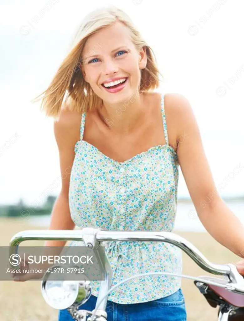 An attractive young woman cycling and having fun