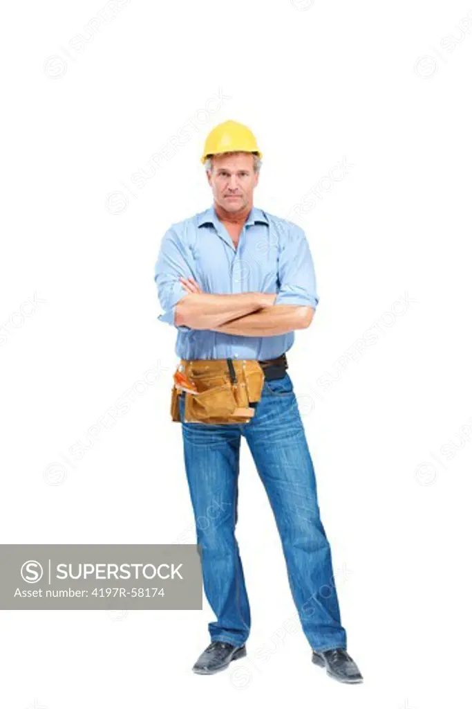 A tough mature handyman crossing his arms while isolated on a white background