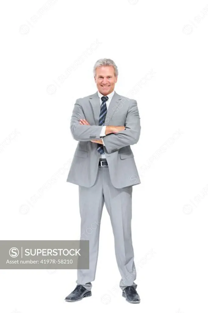 Full-length portrait of a satisfied executive crossing his arms while isolated on white