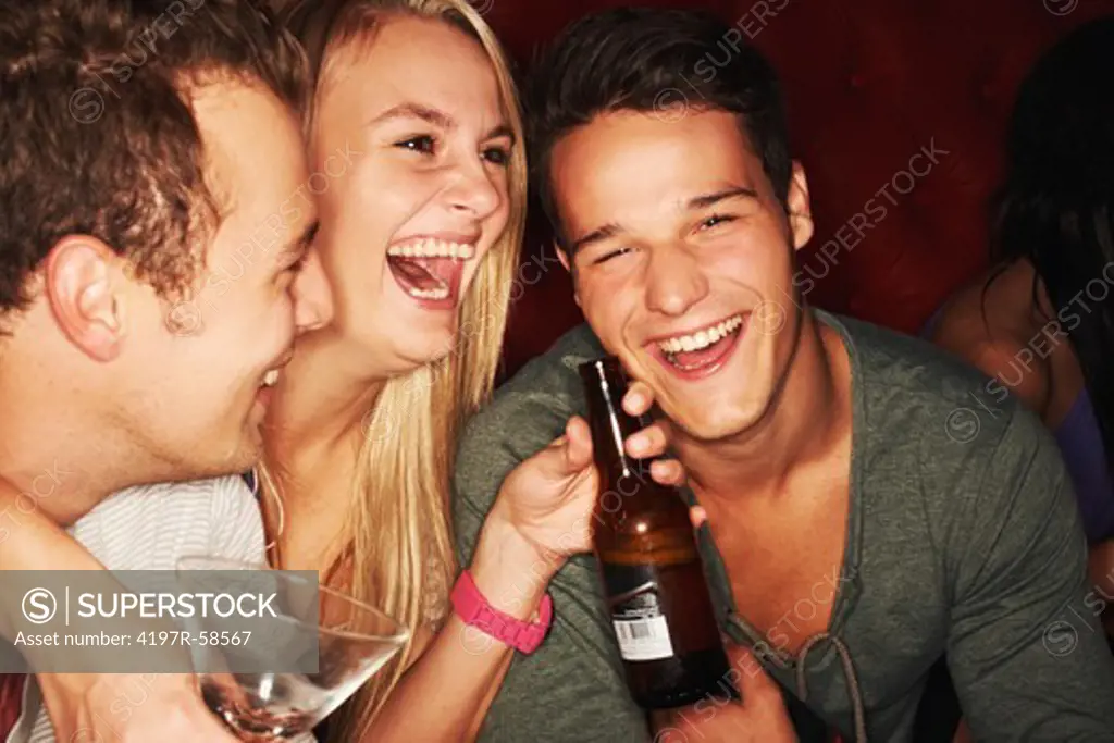 A group of young friends having an awesome time while out partying