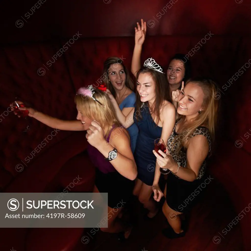 A group of pretty young girls out partying to celebrate their friends birthday
