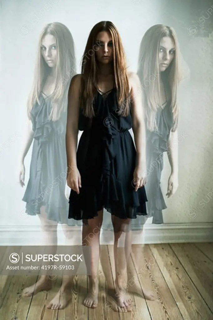 Young woman staring at you with two ghost images of herself on either side