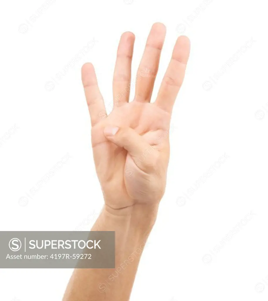 Cropped view of a hand indicating the number four with its fingers