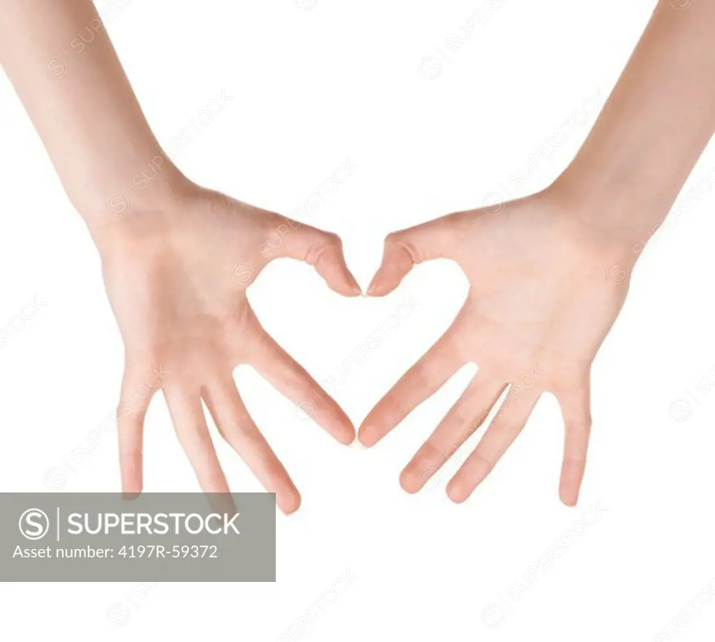 Cropped view of hands making a heart shape against a white background