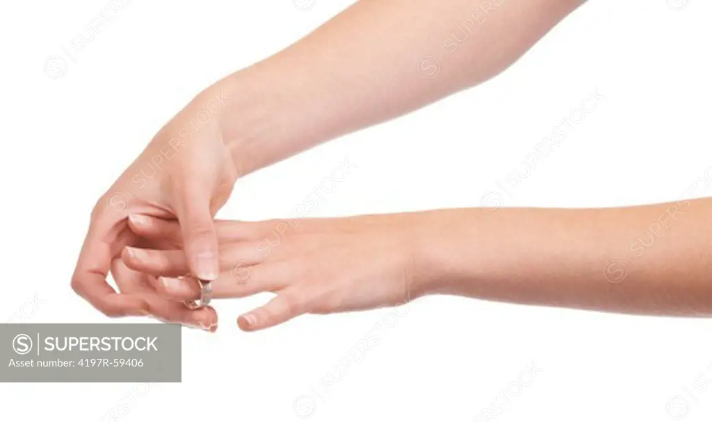 Cropped view of a female hand with a wedding ring on it against a white background