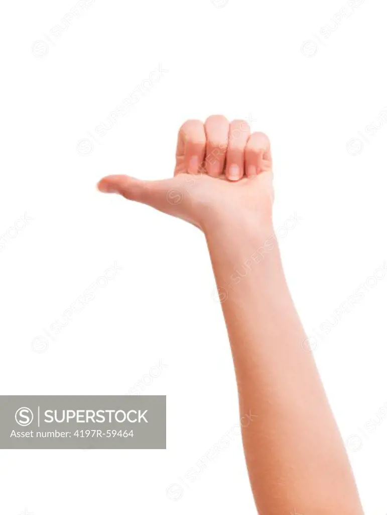 Cropped view of a hand with its thumb pointing outwards against a white background
