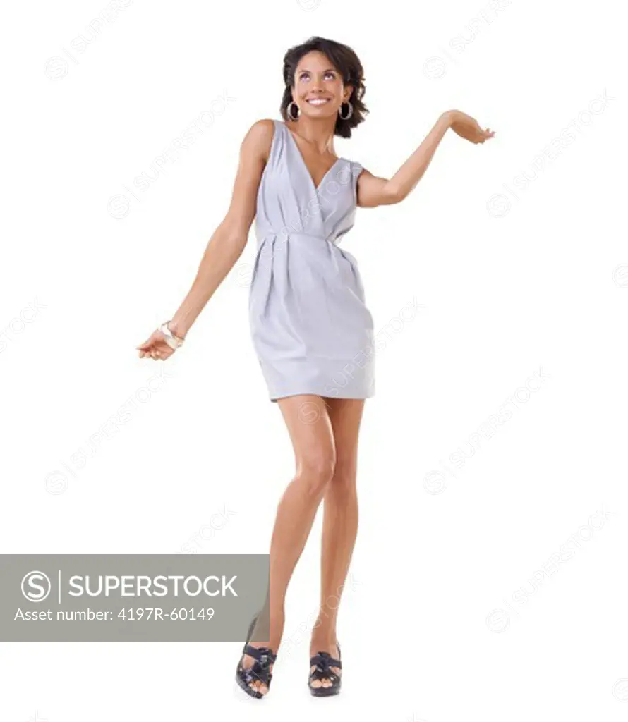 Elegant and excited young African-American woman presenting copyspace with a smile