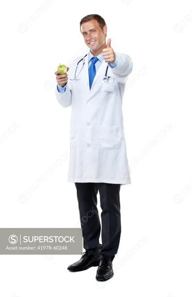 Studio shot of a handsome young doctor holding up an apple with a bite taken from it and giving the thumbs up sign isolated on white