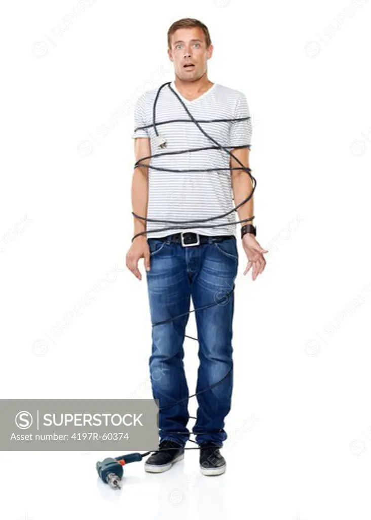 An incompetent young man tied up with the cord of his power drill