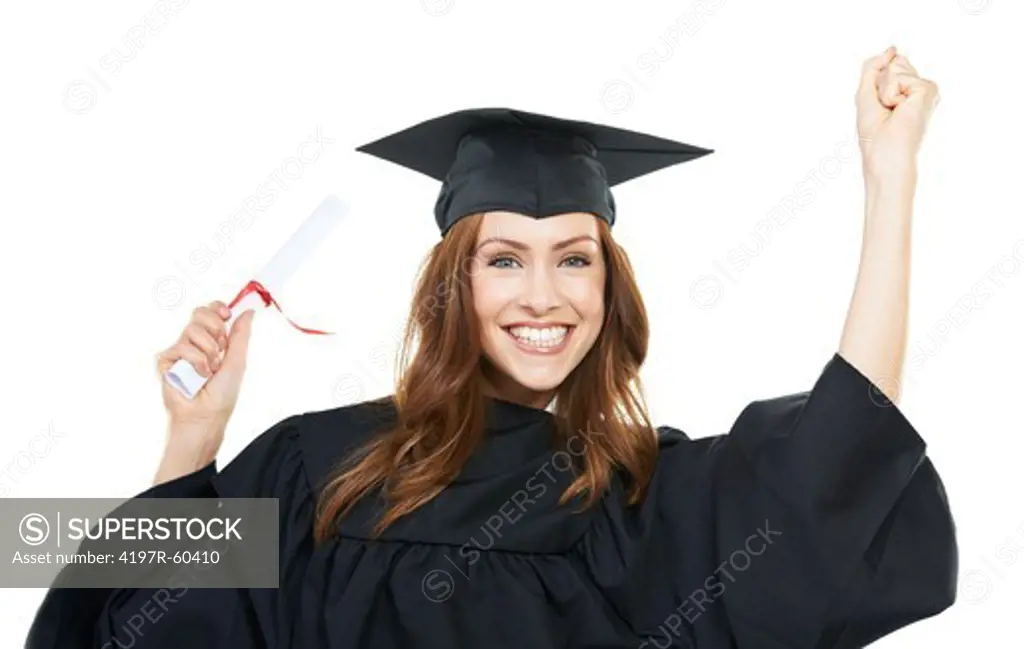 Portrait of a happy young woman in a graduation cap and gown holding her diploma