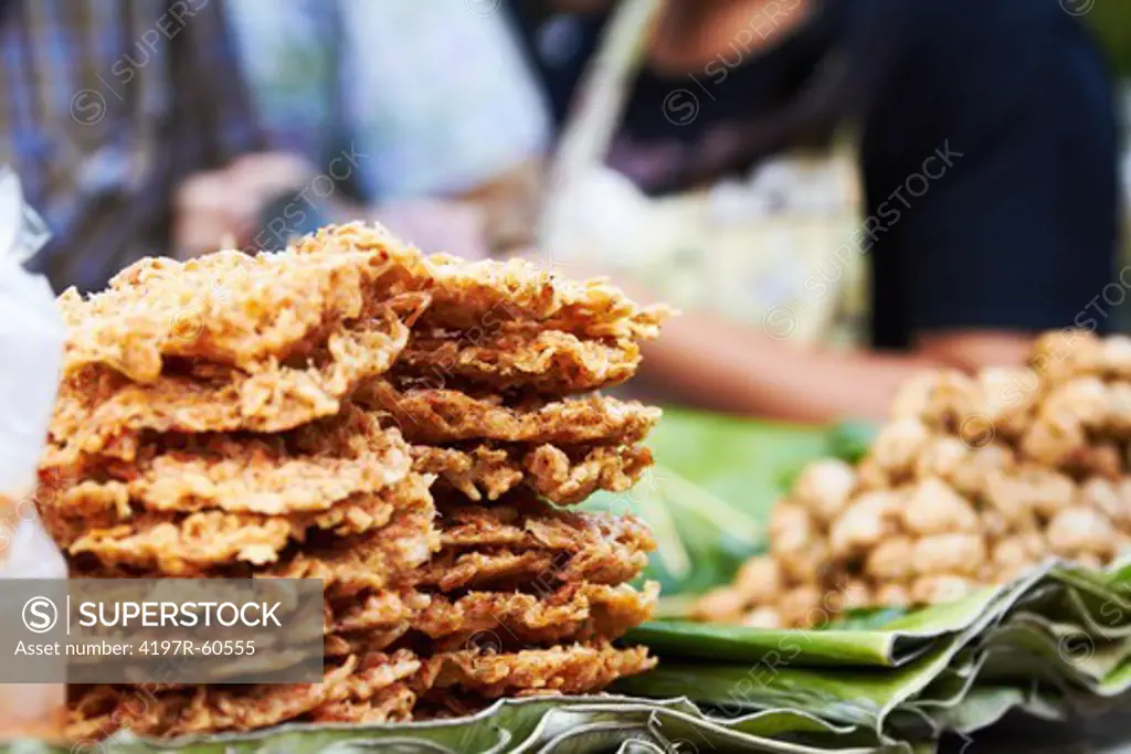 Traditional Thai snacks for sale at an outdoor market