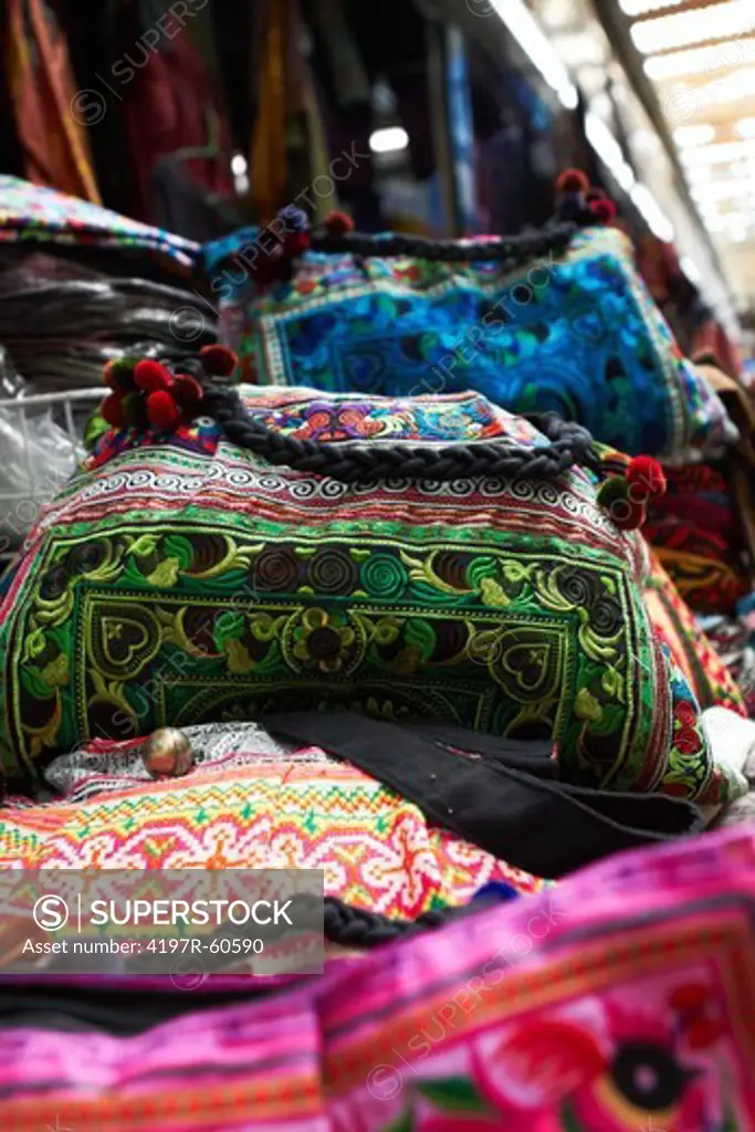 Traditional Thai handbags on sale at an outdoors market