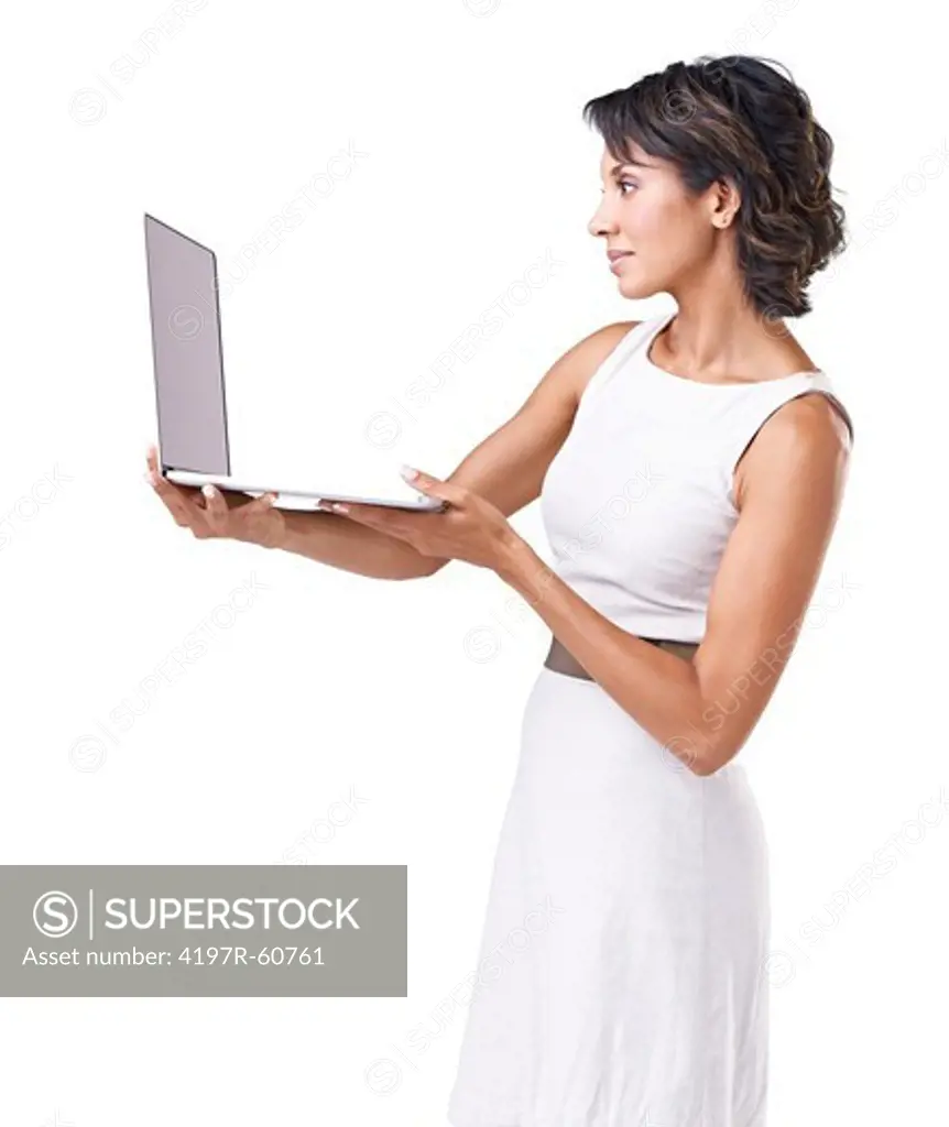 Gorgeous young ethnic woman working on a laptop