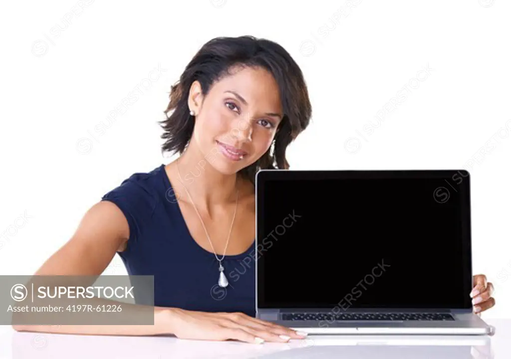 Portrait of a young woman showing you a laptop screen
