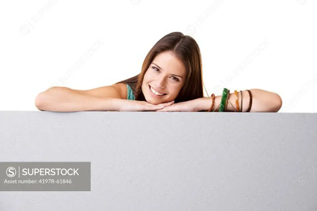 Portrait of an attractive young girl leaning on copyspace