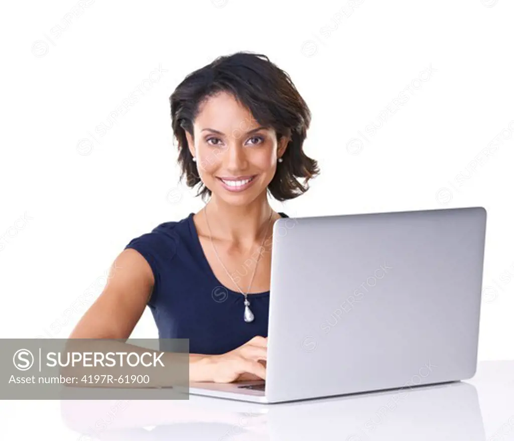 Portrait of a young woman sitting with her laptop