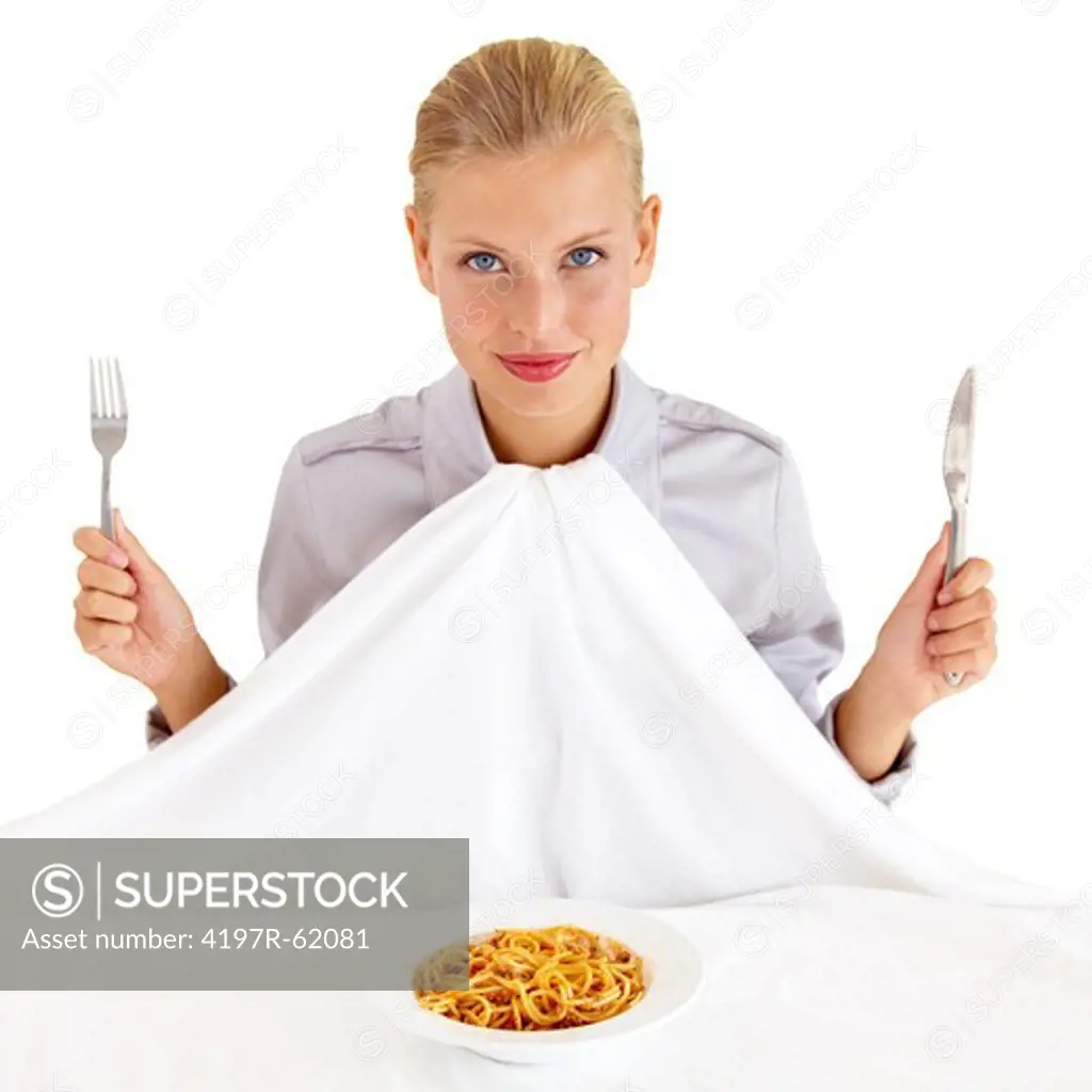 Portrait of an attractive young woman ready to eat a bowl of pasta