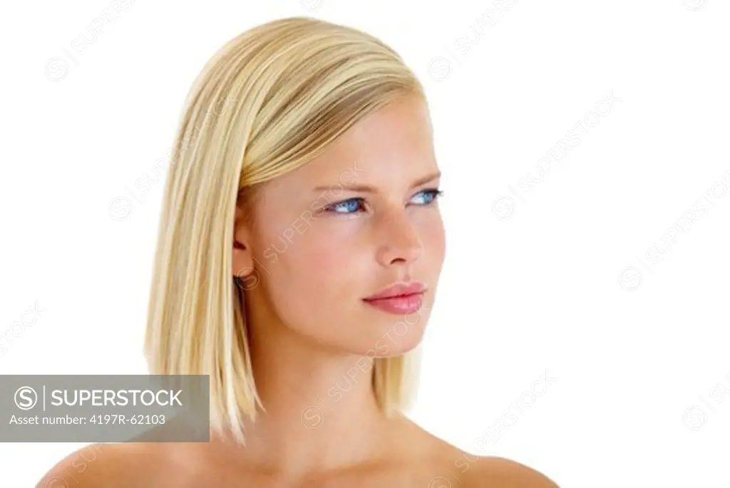 Head and shoulders studio shot of an attractive young woman isolated on white