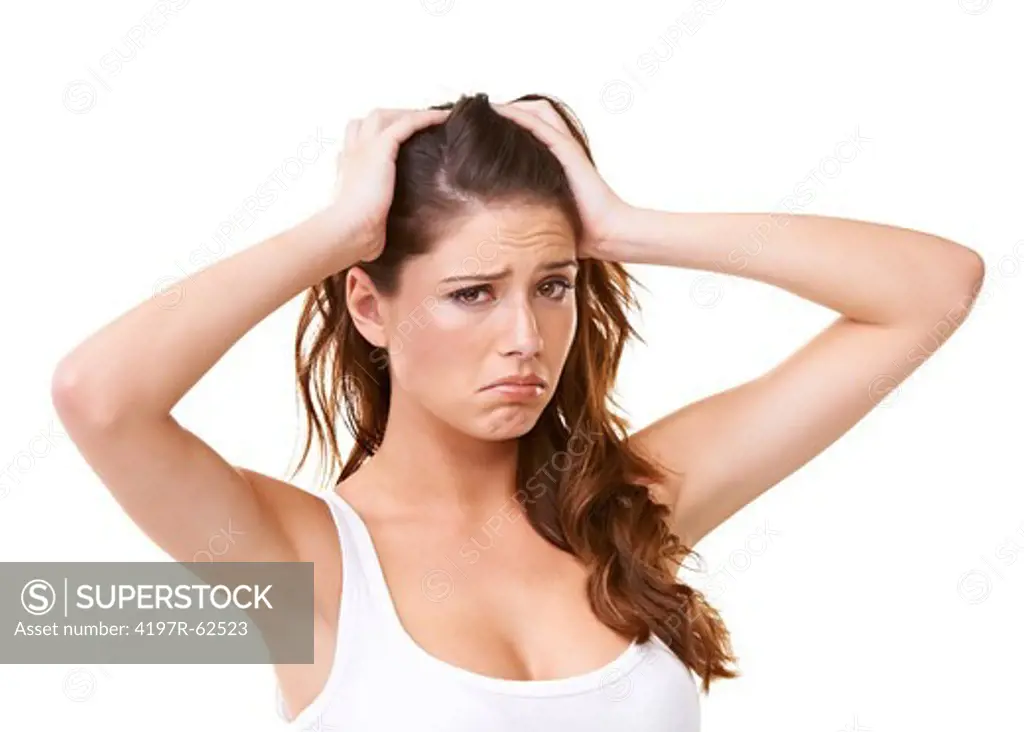 Studio portrait of a stress out-looking woman isolated on white