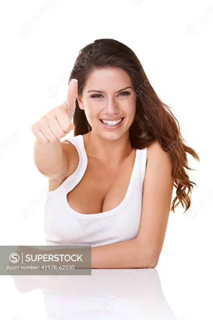 Shot of an attractive young woman giving the 'thumbs up' to the camera and smiling