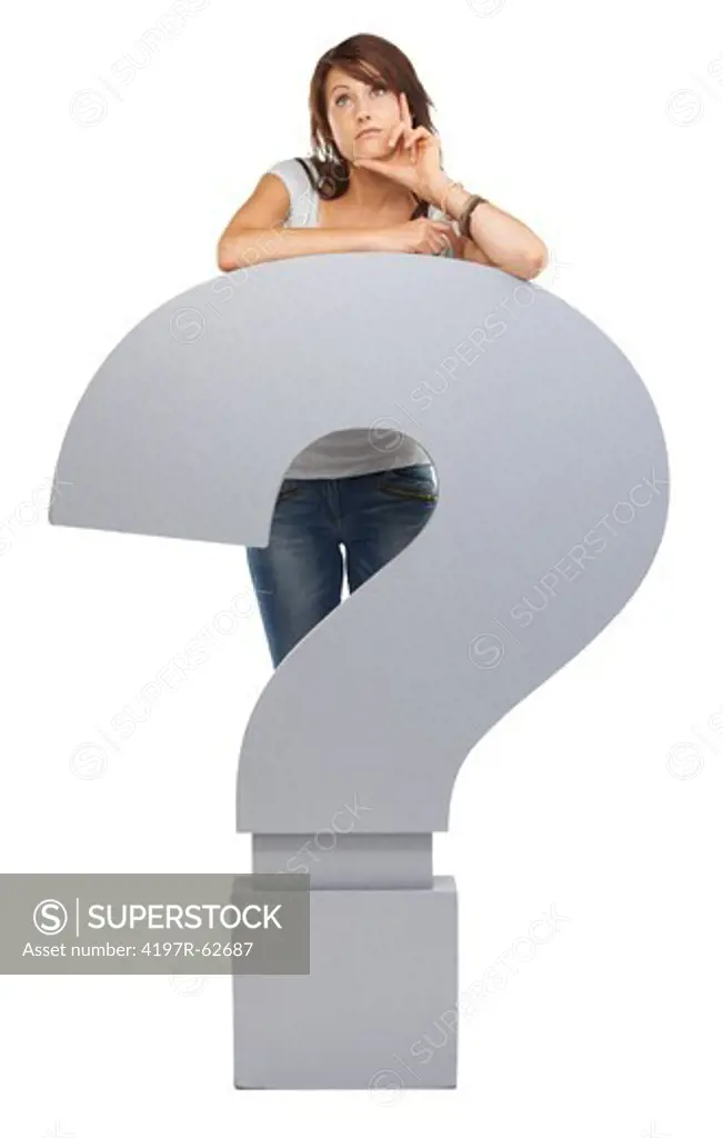 Full length studio concept shot of a young woman standing behind a large question mark isolated on white