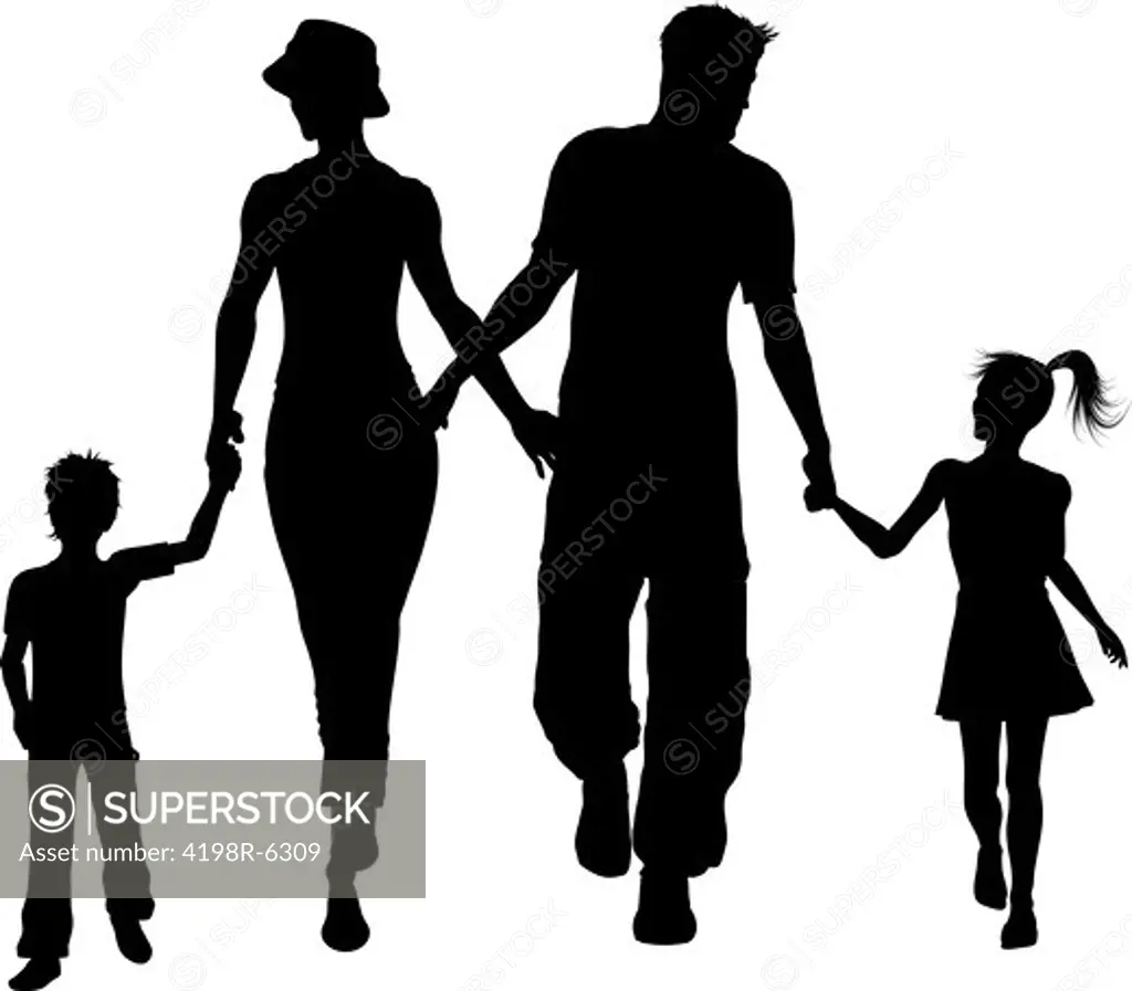 Silhouette of a family walking holding hands