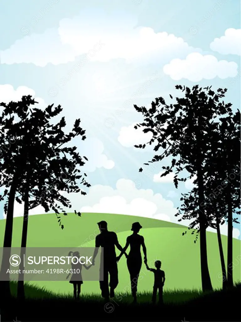 Silhouette of a family walking outside in the countryside