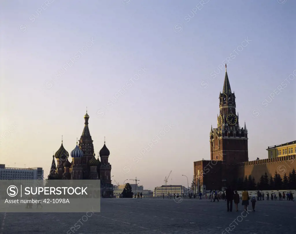 Group of people walking in front of a church, St. Basil's Cathedral, Red Square, Moscow, Russia