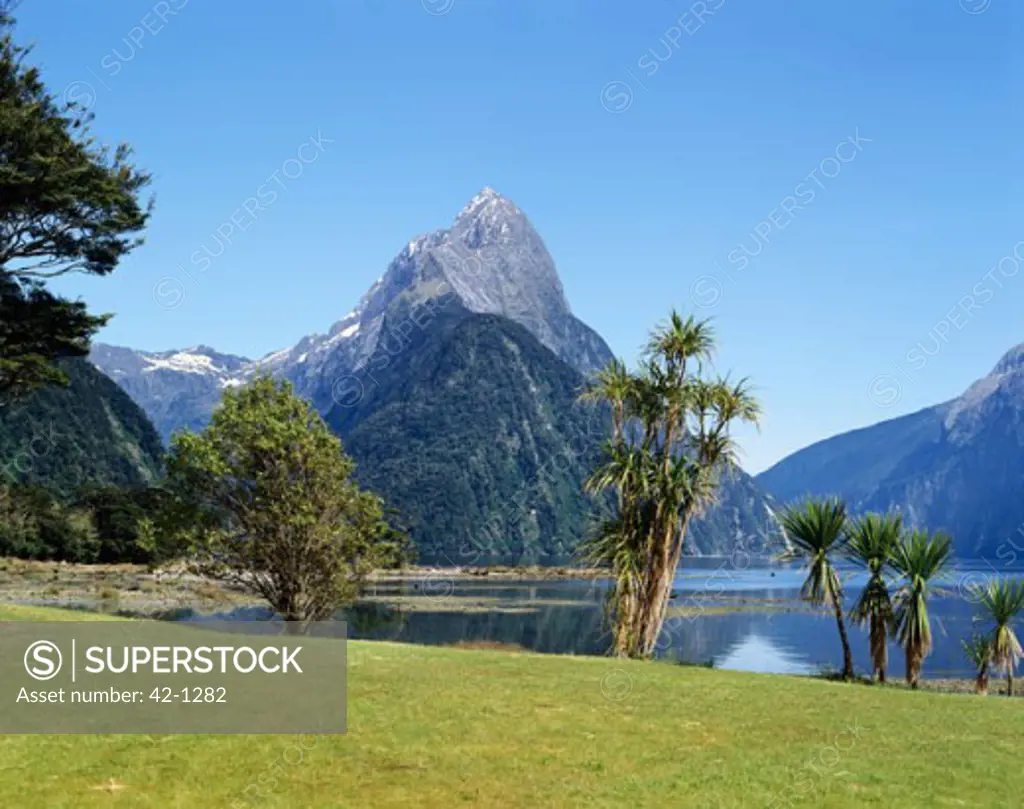 Reflection of mountains in water, Mitre Peak, Milford Sound, South Island, New Zealand