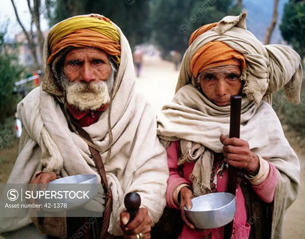 Portrait of a senior couple begging, Kathmandu, Nepal