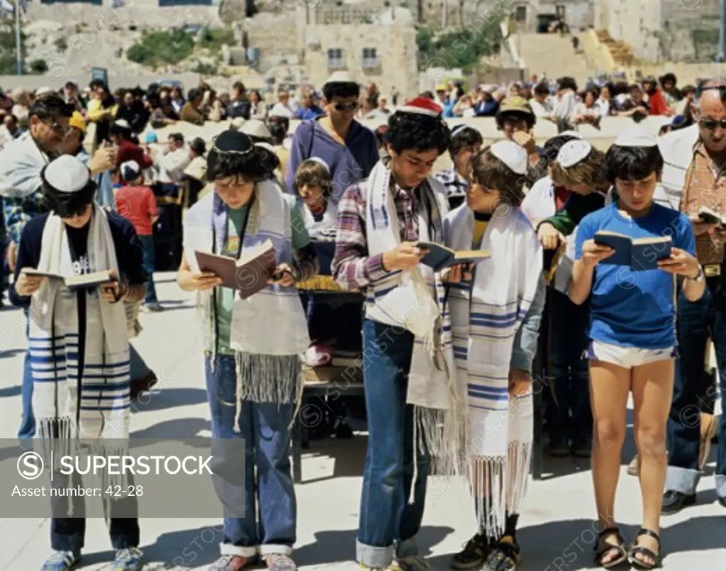 Group of people praying near the Wailing Wall, Jerusalem, Israel