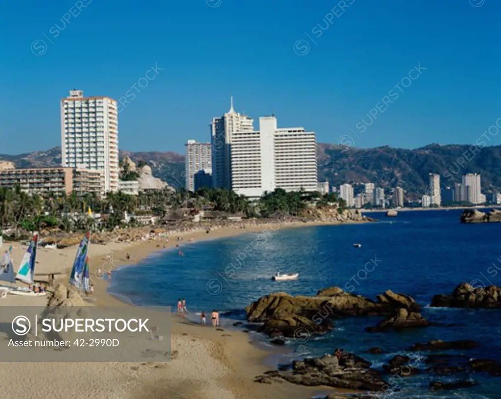 High angle view of tourists on the beach, Acapulco, Guerrero, Mexico