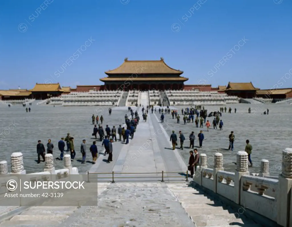Tourists in a pavilion, Hall of Supreme Harmony, Forbidden City, Beijing, China