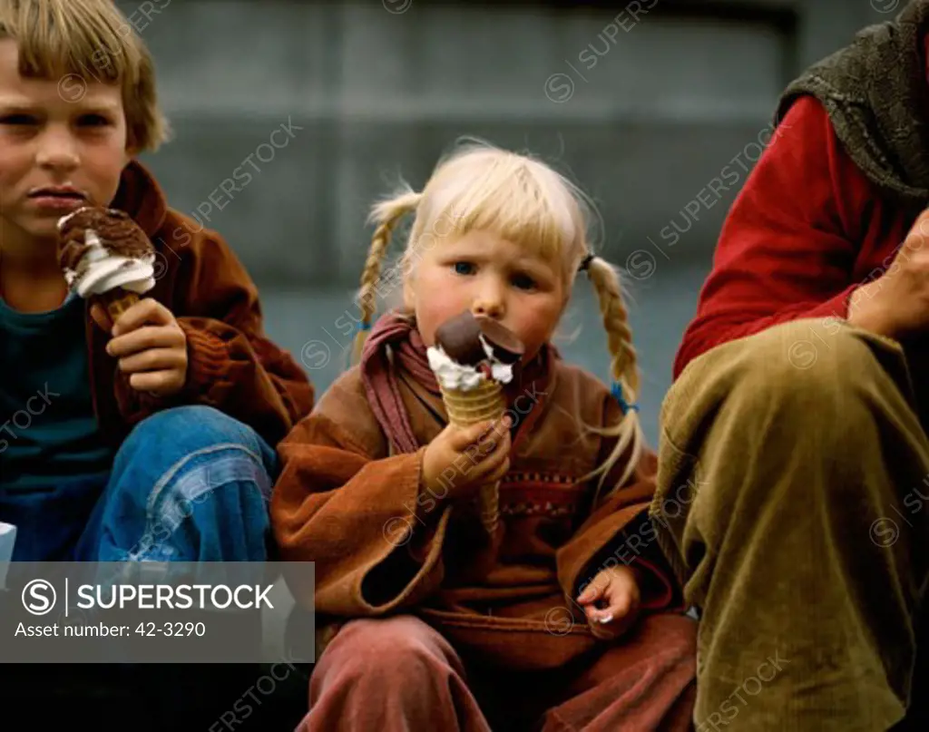 Boy and a girl eating ice cream, Copenhagen, Denmark