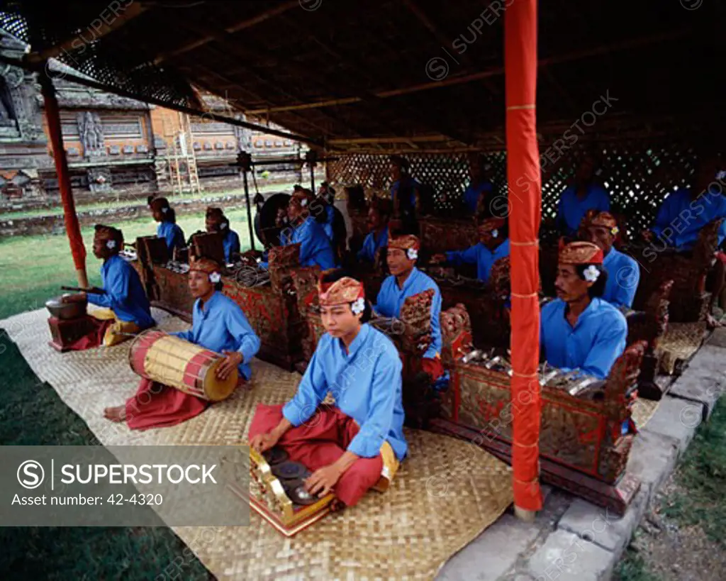 Group of musicians playing musical instruments, Gamelan Orchestra, Bali, Indonesia