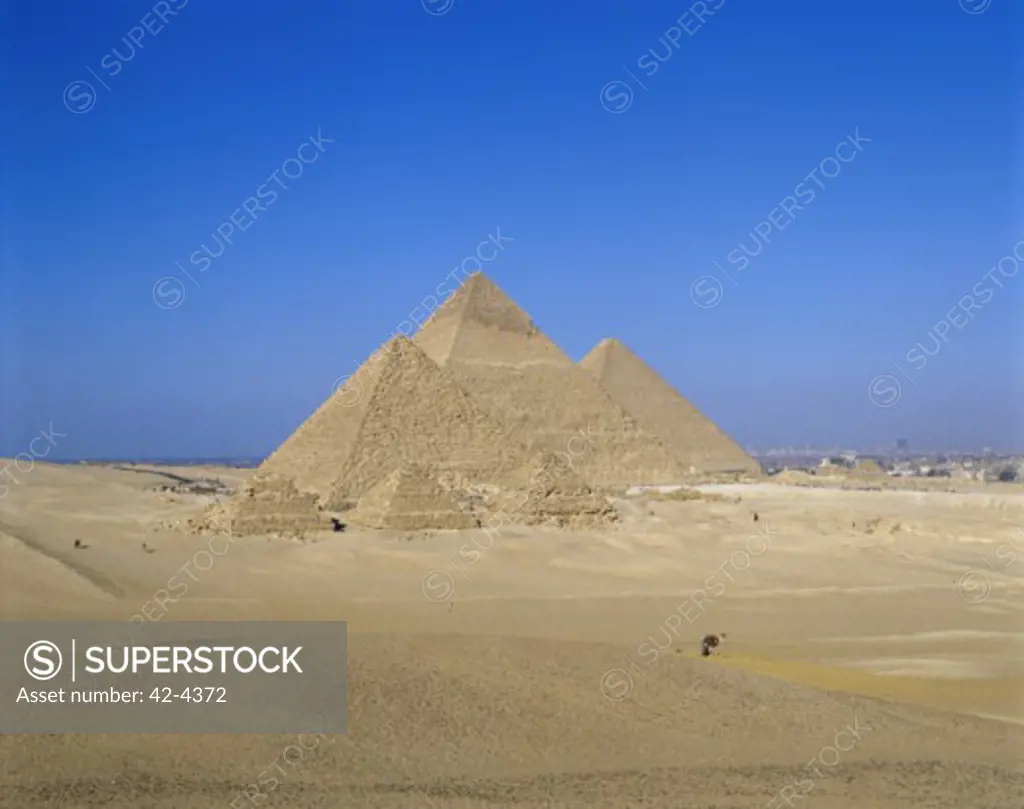 Pyramids on an arid landscape, Giza Pyramids, Giza, Egypt