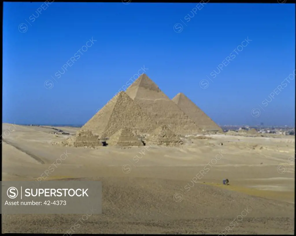 Pyramids on an arid landscape, Giza Pyramids, Giza, Egypt