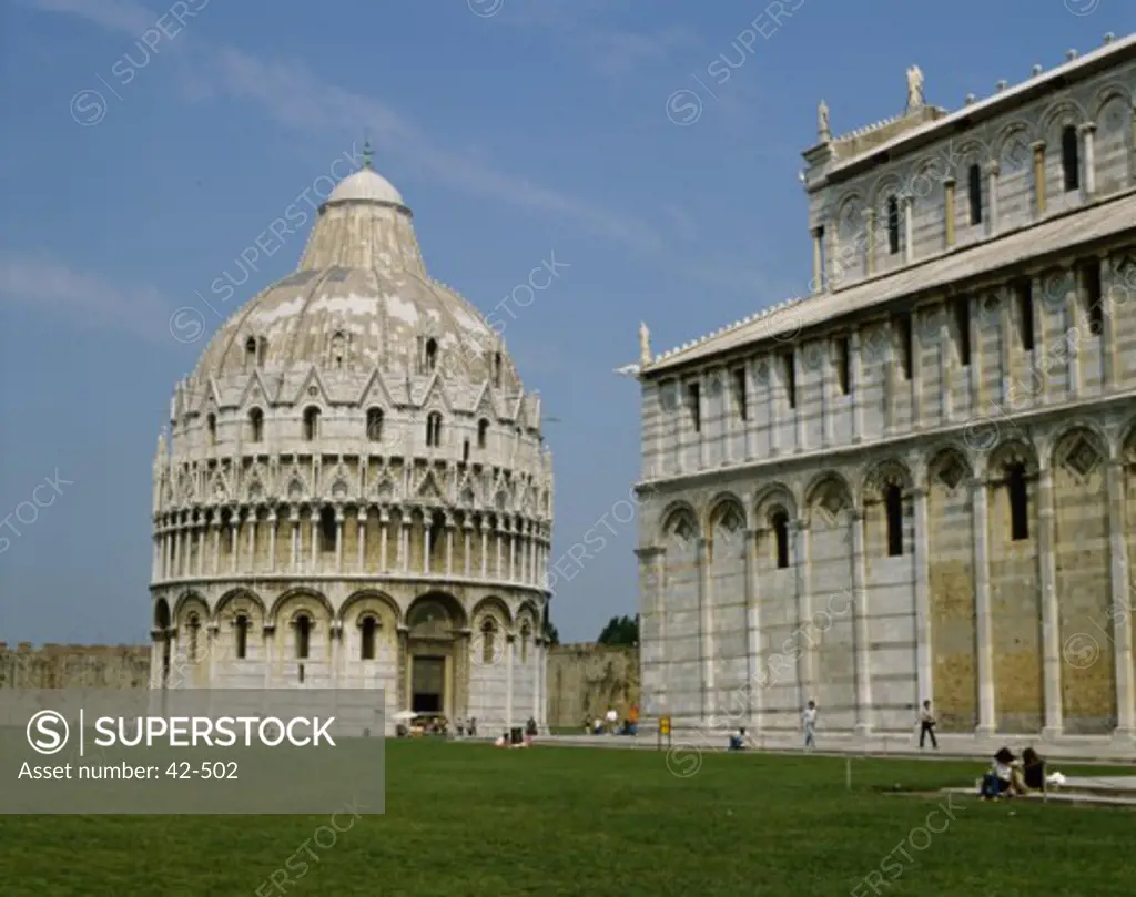 Tourists at a cathedral, Baptistery, Duomo, Pisa, Italy