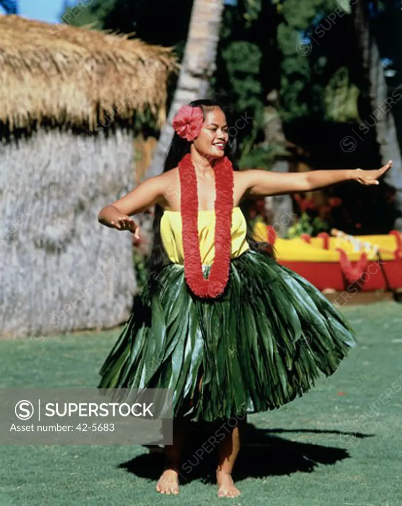 Young woman dancing, Kodak Hula Show, Waikiki Beach, Honolulu, Oahu, Hawaii, USA