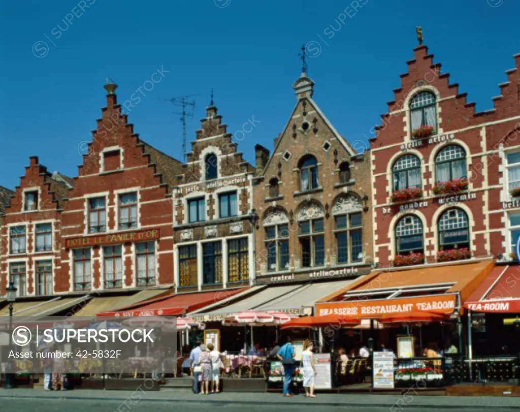 Group of people sitting at a sidewalk cafe, Grote Markt, Brugge, Belgium