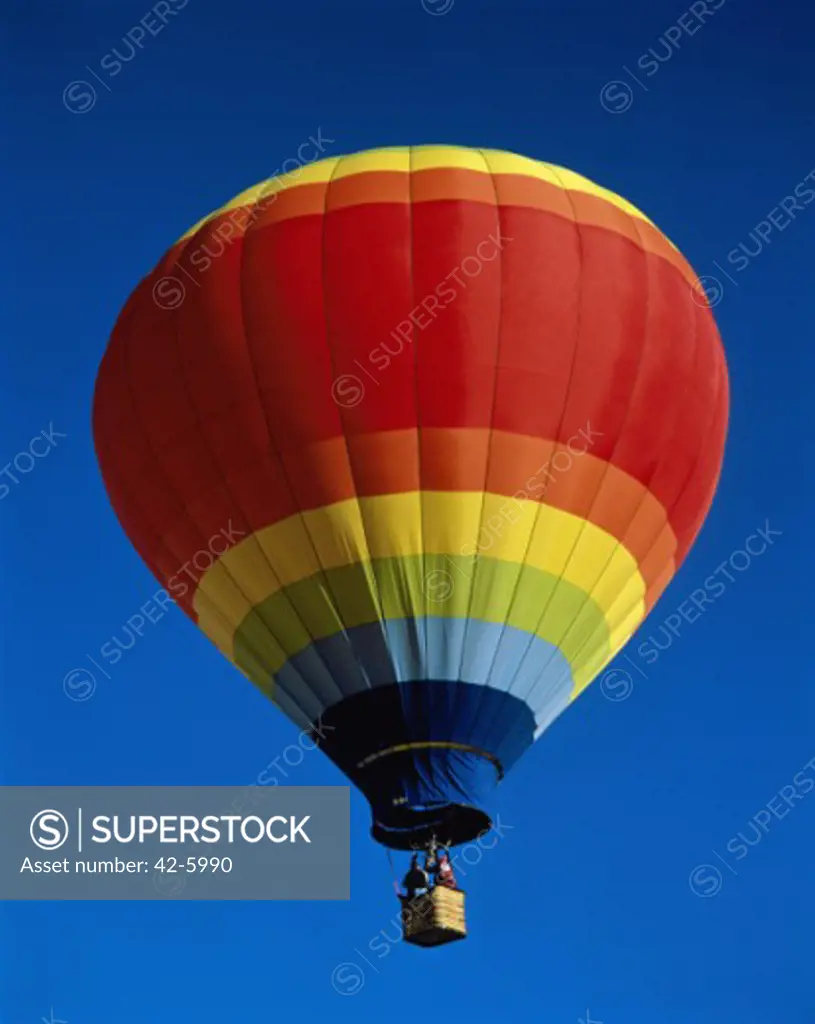 Low angle view of a hot air balloon rising, Albuquerque International Balloon Fiesta, Albuquerque, New Mexico, USA