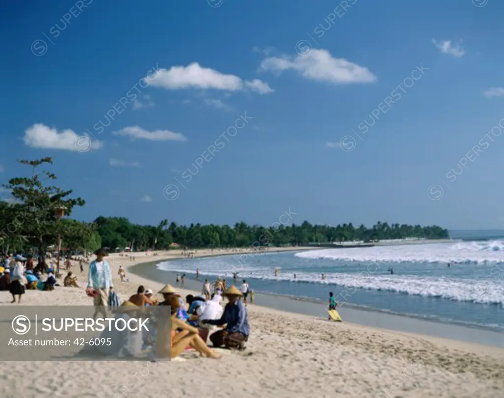 High angle view of tourists on the beach, Kuta Beach, Bali, Indonesia