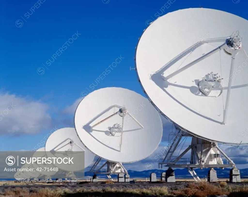 Radio telescopes in a row on a landscape, VLA Radio Telescope, National Radio Astronomy Observatory, New Mexico, USA