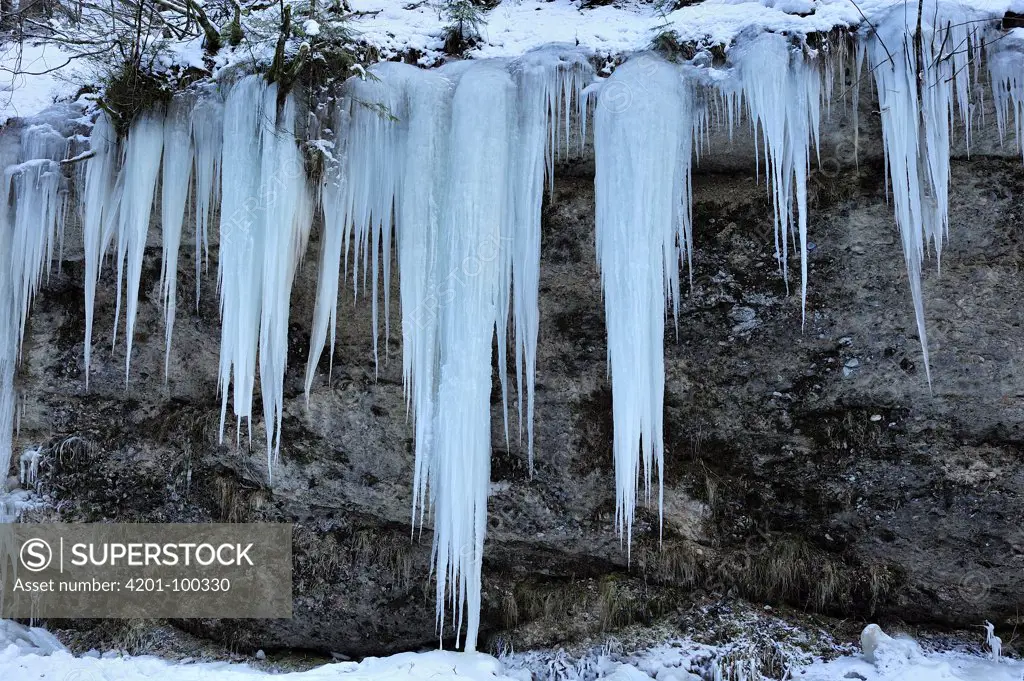 Icicles of frozen waterfall, Switzerland